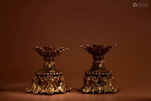 A PAIR OF GILT BRONZE LOTUS CANDLESTICKS