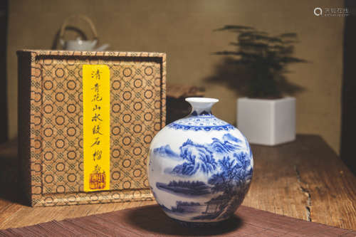 A BLUE AND WHITE LANDSCAPE OVOID JAR