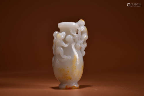 A HETIAN JADE CARVING OF MONKEY AND PEACH INCENSE HOLDER