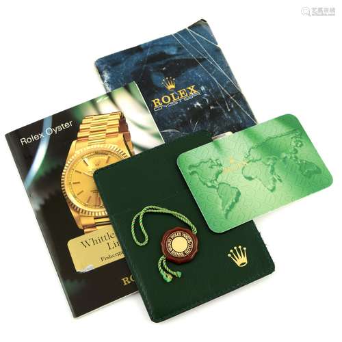 ROLEX - an group of assorted wallets, booklets, swing tags a...