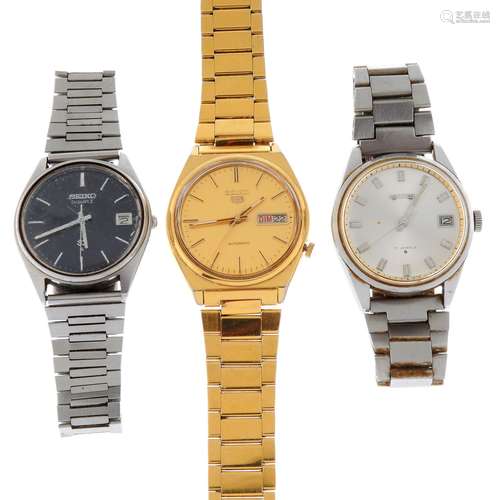 A group of eight assorted Seiko watches.