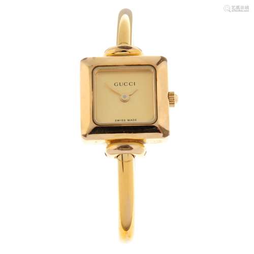 GUCCI - a 1900L bangle watch.