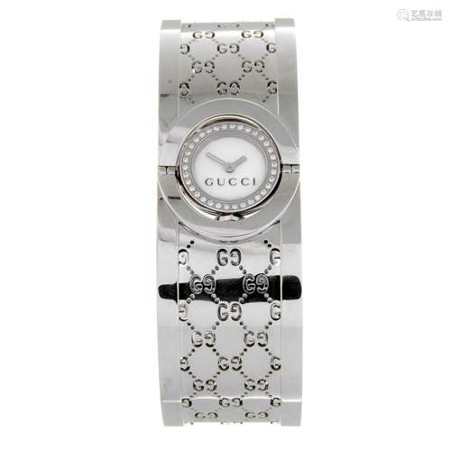 GUCCI - a Twirl bangle watch.