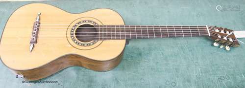 A Victorian parlour guitar, by J. Gerard, 50 King Street, Lo...