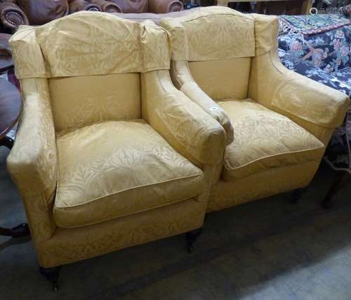 A pair of Victorian square framed armchairs, upholstered in ...