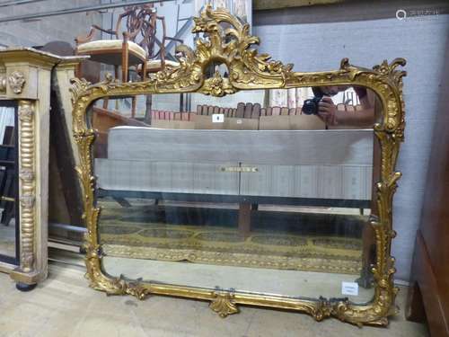 A Victorian style gilt framed wall mirror with pierced surmo...