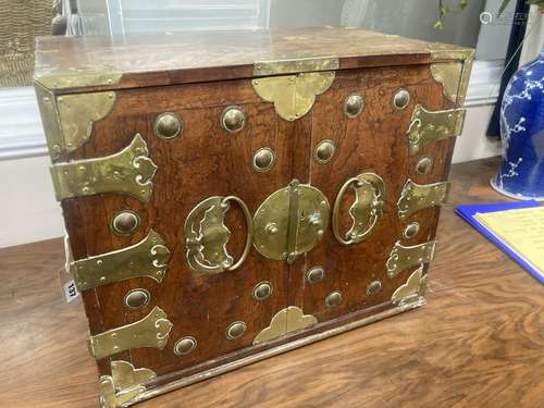 A Korean brass-bound elm small cabinet,fitted a pair of door...