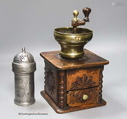 An 18th century oak and brass coffee grinder and a pewter mu...