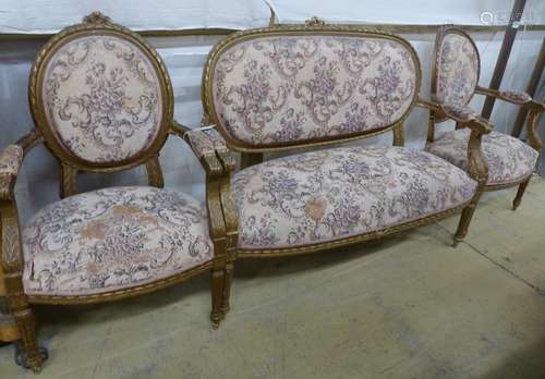 A Louis XV style carved wood three piece salon suite, settee...