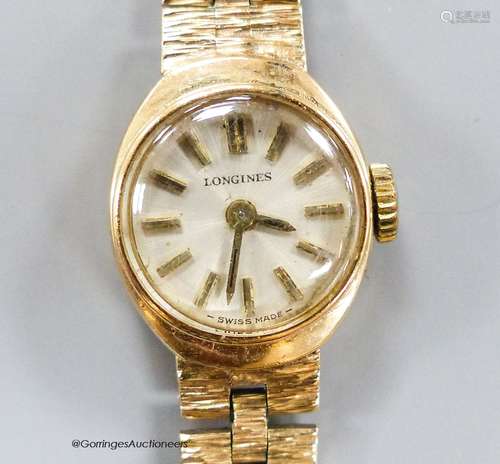 A lady's 9ct gold Longines wristwatch, overall 18.5cm, gross...