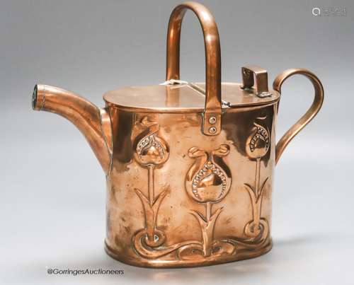 An Art Nouveau Joseph Sankey embossed copper water can, heig...