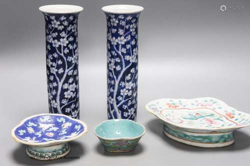 A pair of blue and white sleeve vases and three polychrome d...