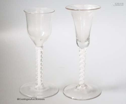 Two 18th century cotton twist stemmed wine glasses, tallest ...