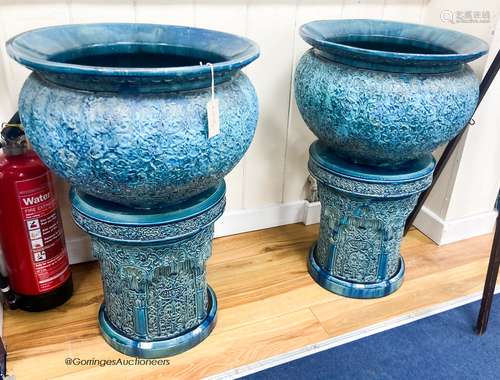 A pair of large Burmantofts style blue glazed moorish design...