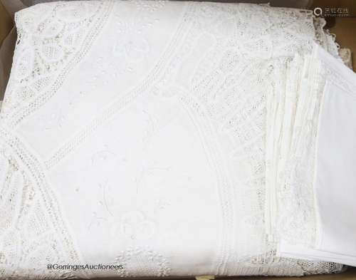 A finely worded tapelace and cutwork white tablecloth with m...