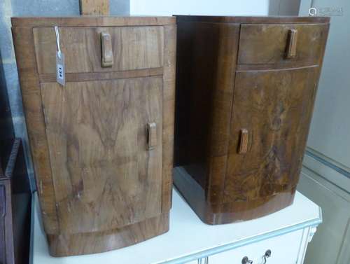 A pair of Art Deco walnut bedside cabinets, W.38cm D.38cm H....