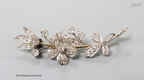 A mid 20th century white metal and diamond set floral spray ...