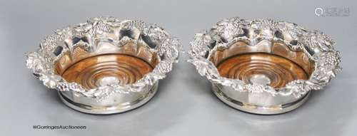 A pair of Victorian silver plated wine coasters, 19cm