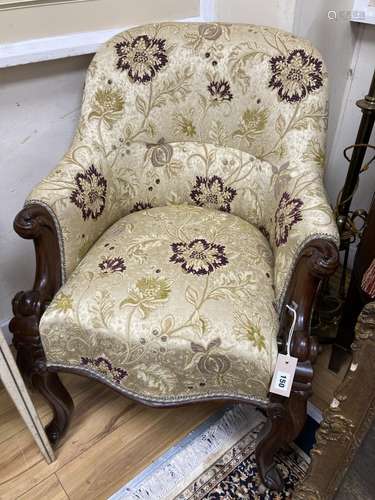 A Victorian upholstered carved mahogany tub chair. W-64, H-8...