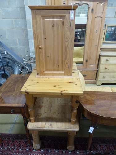 Two rectangular pine coffee tables, a pedestal and a wall ca...