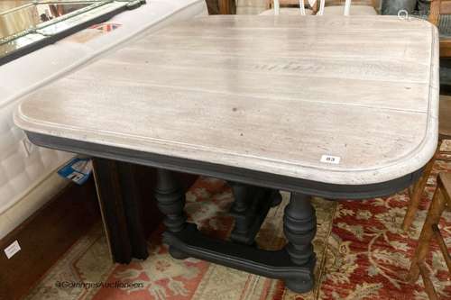 A 19th century French stripped oak and painted extending din...