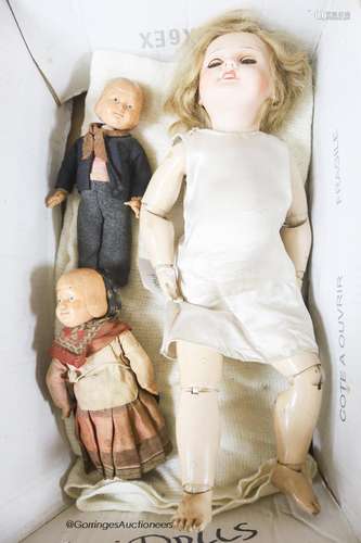 A bisque headed doll, believed by family repute to have been...