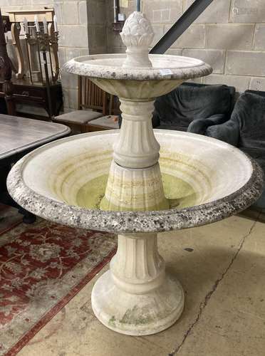 A reconstituted stone circular two tier garden fountain, (fa...