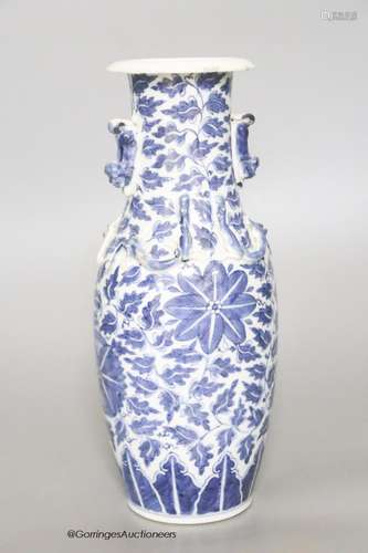 A late 19th / early 20th century Chinese blue and white vase...