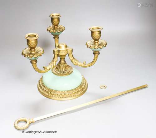 An ormolu lamp and a small print