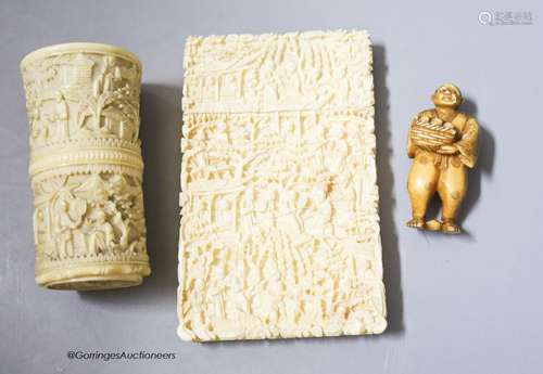 A Canton ivory card case, 11 x 7cm, a dice shaker and a Japa...