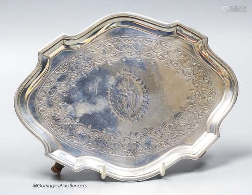 A George III silver shaped oval teapot stand, Charles Hougha...