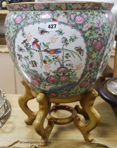 A modern Cantonese export famille rose fish bowl, on hardwoo...