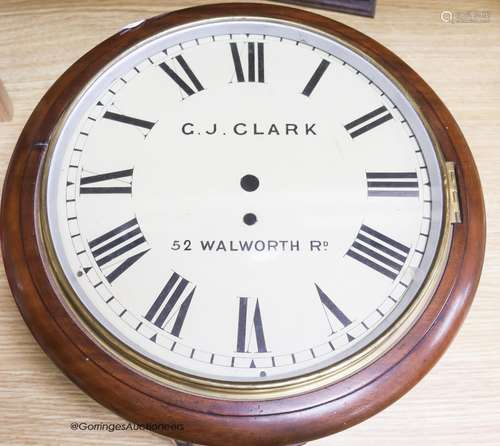 A Victorian mahogany circular wall clock, by G.J. Clark, pen...