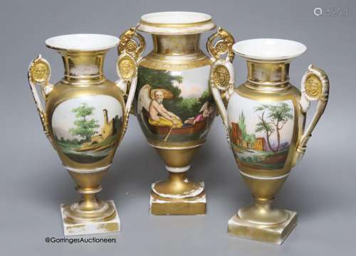 A 19th century French porcelain garniture of three vases, he...