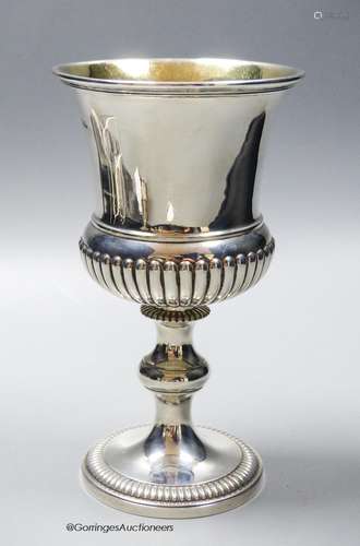 A late George III silver urn shaped goblet, with fluted bell...