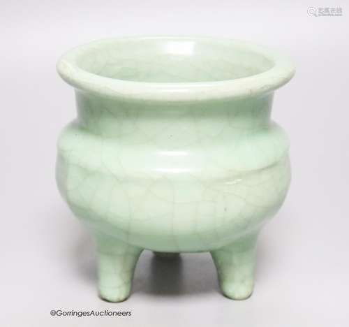 A Chinese green crackle glazed tripod censer, height 12cm