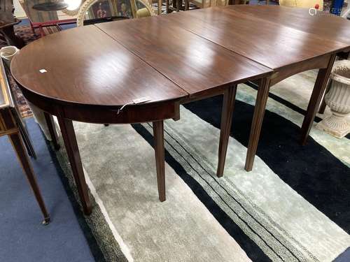 A George III mahogany D end extending dining table. 220cm ex...