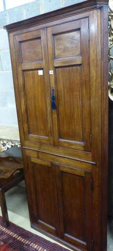 A George III mahogany four door standing corner cabinet, W.9...