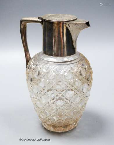 A George V silver mounted cut glass claret jug, Goldsmiths &...