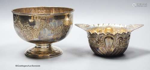 A late Victorian repousse silver two handled bowl, London, 1...