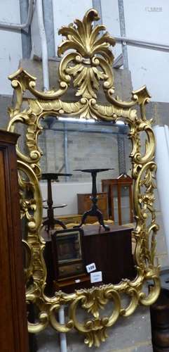 A George III style carved giltwood wall mirror, W.60cm H.114...