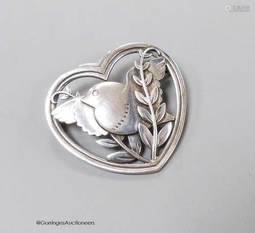 A Georg Jensen sterling heart shaped, 'bird amid foliage' br...