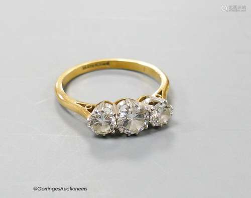 An 18ct & Pt mounted three stone diamond ring, size O, gross...