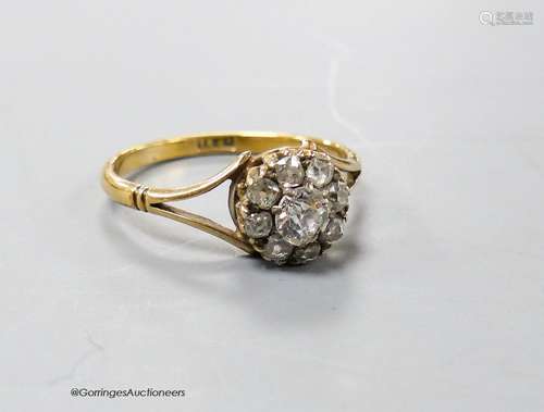 An 18ct and old round cut diamond set cluster ring, size Q, ...