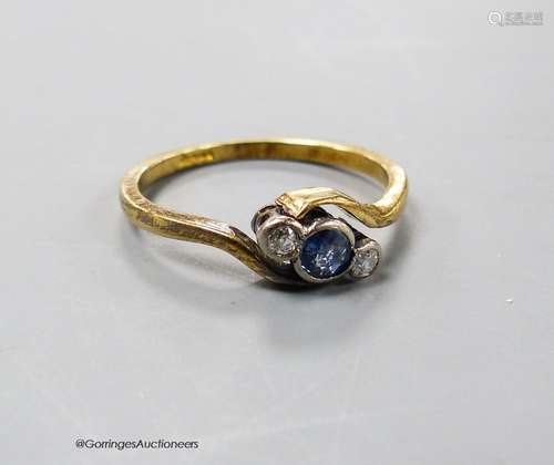 An early 20th century yellow metal, sapphire and diamond set...