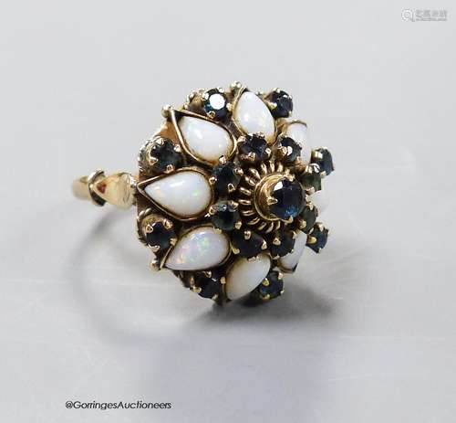 A yellow metal (stamped 18k), white opal and sapphire cluste...