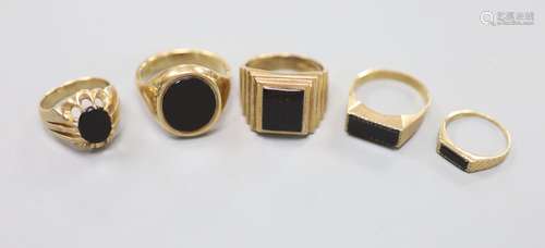 Three assorted 9ct and black onyx signet rings and two other...