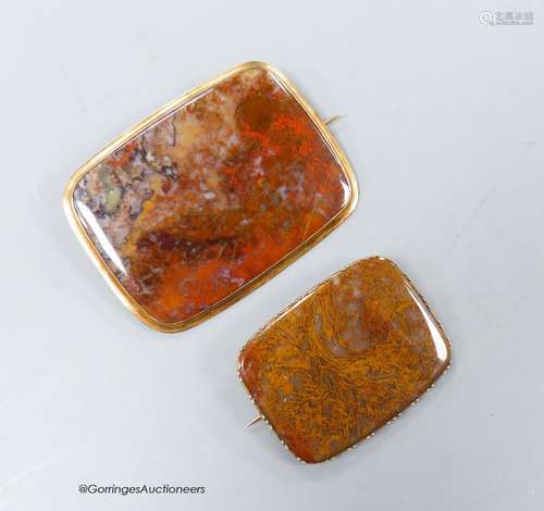 Two early 20th century yellow metal mounted agate shaped squ...