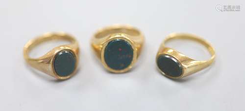 Three assorted modern 9ct gold and bloodstone set signet rin...