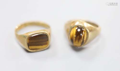 Two modern 9ct gold and tiger's eye quartz set signet rings,...